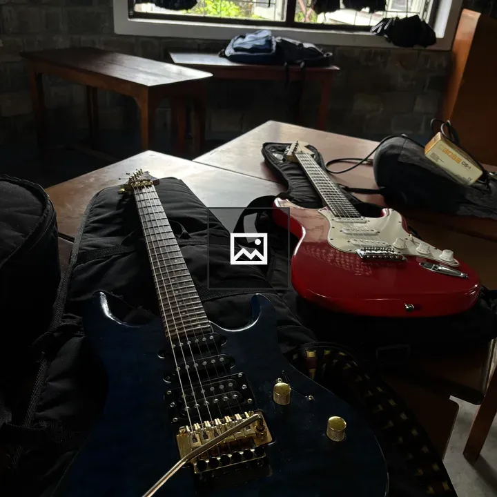 Two Electric Guitars on Table