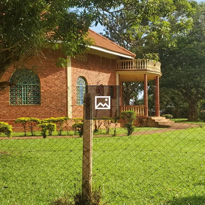Red-brick House with Balcony