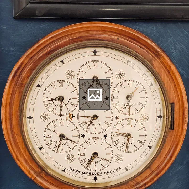 Wooden wall clock with world dials
