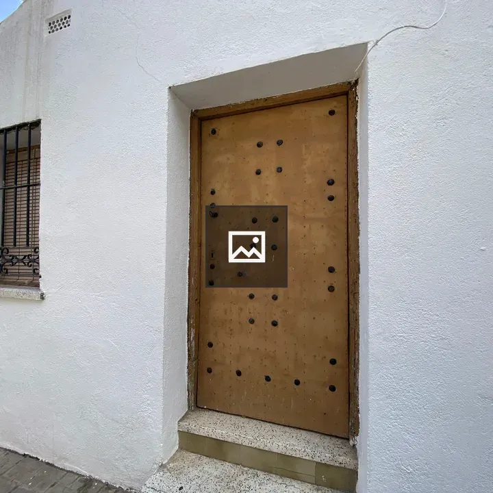 Wooden Door with Iron Details