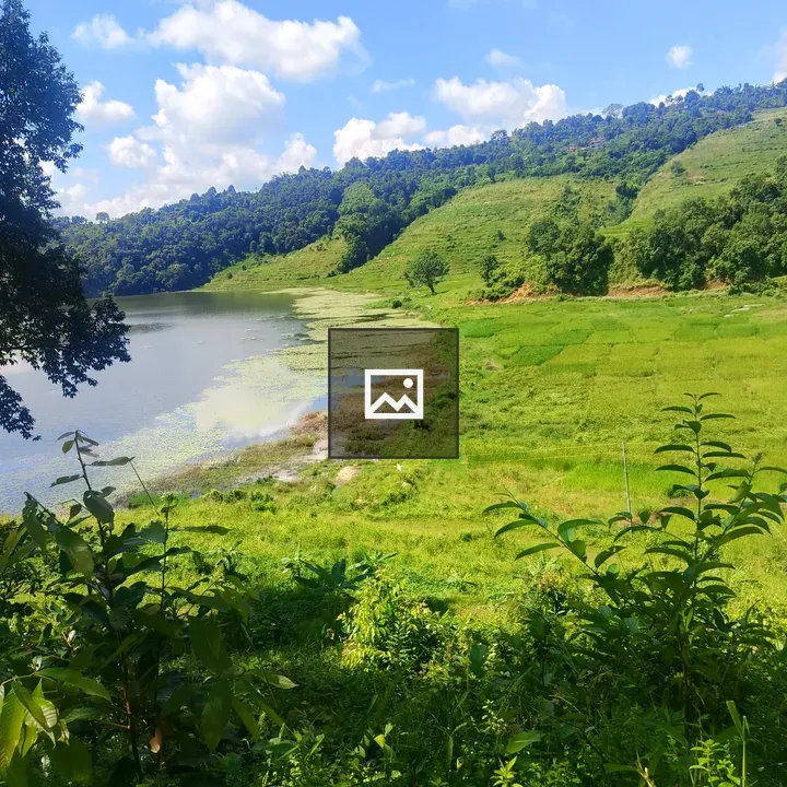 Serene landscape with water and hills