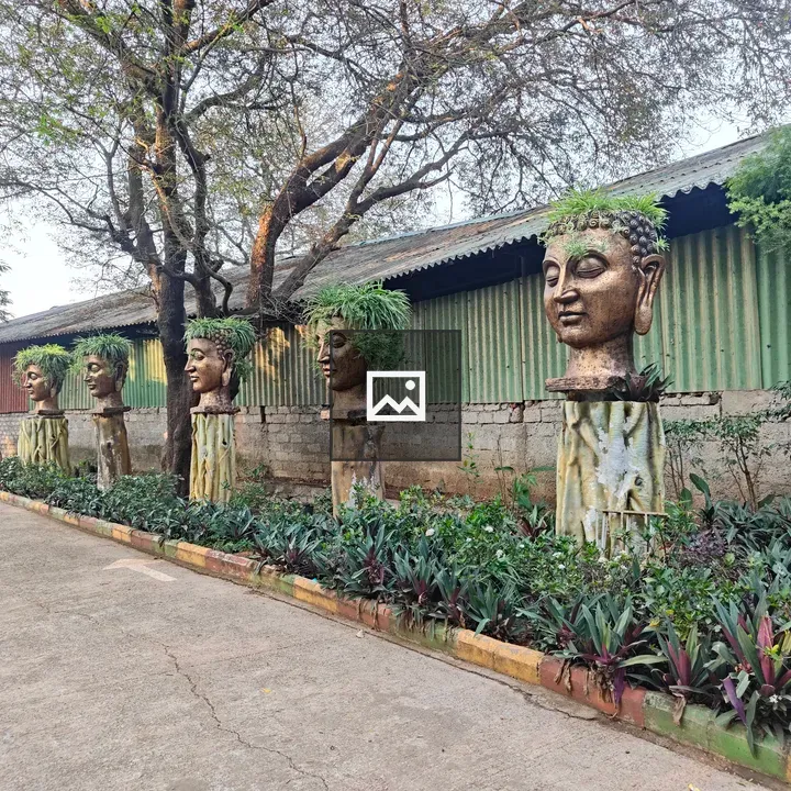 Row of Buddha-like Heads on Pedestals