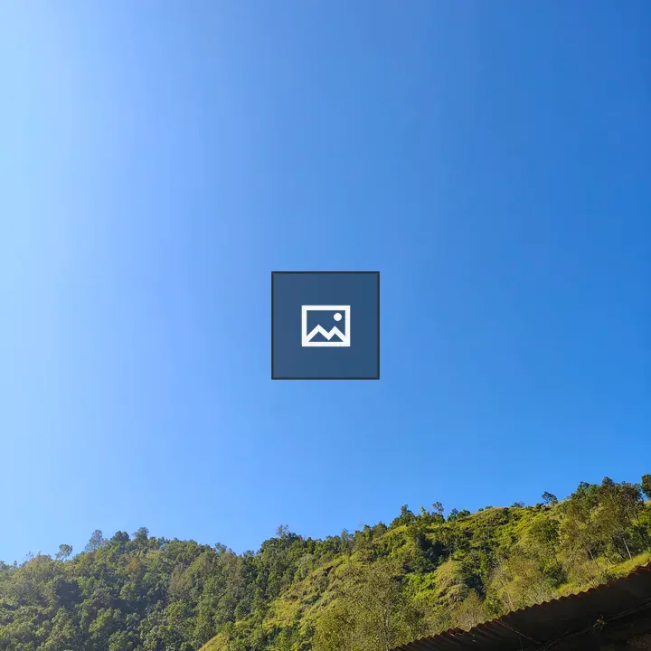 Blue Sky Over Green Hills with Roof Edge
