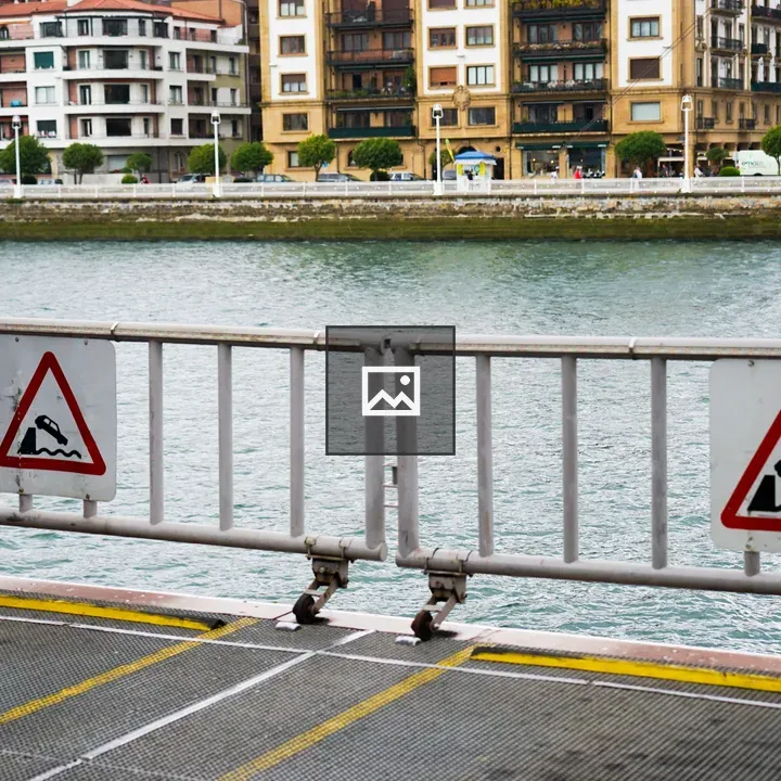 Boarding a Ferry Under Warning Signs