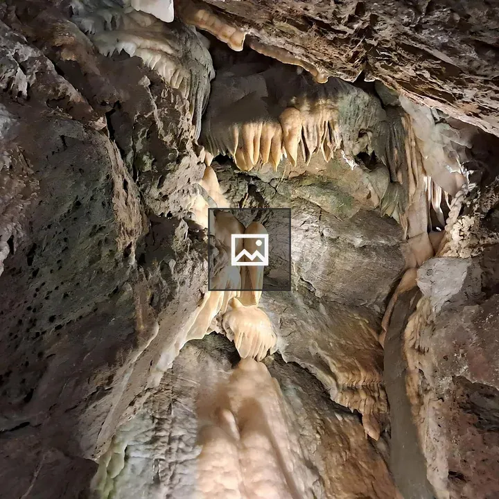 Cave Interior with Stalactites and Stalagmites