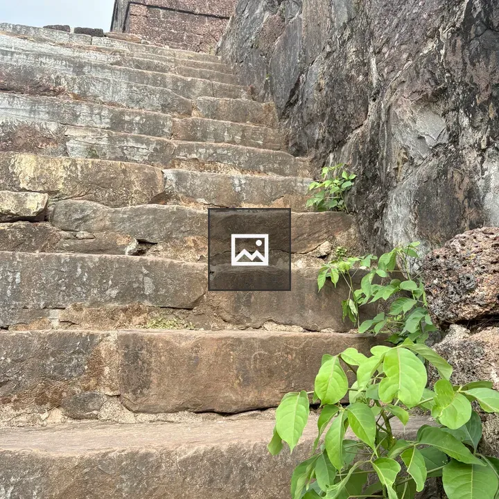 Stone steps to brick tower