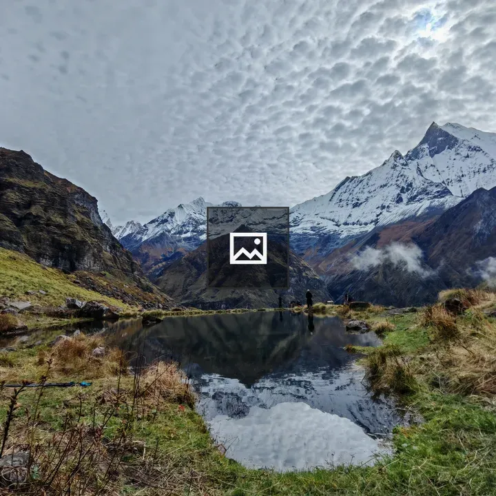 Reflection of Mount Machapuchare in a Pond