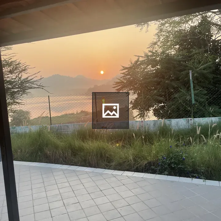 Sunset over lakeside porch