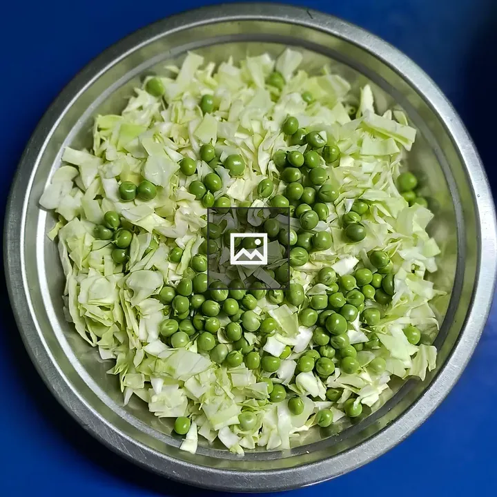 Bowl of green peas and cabbage