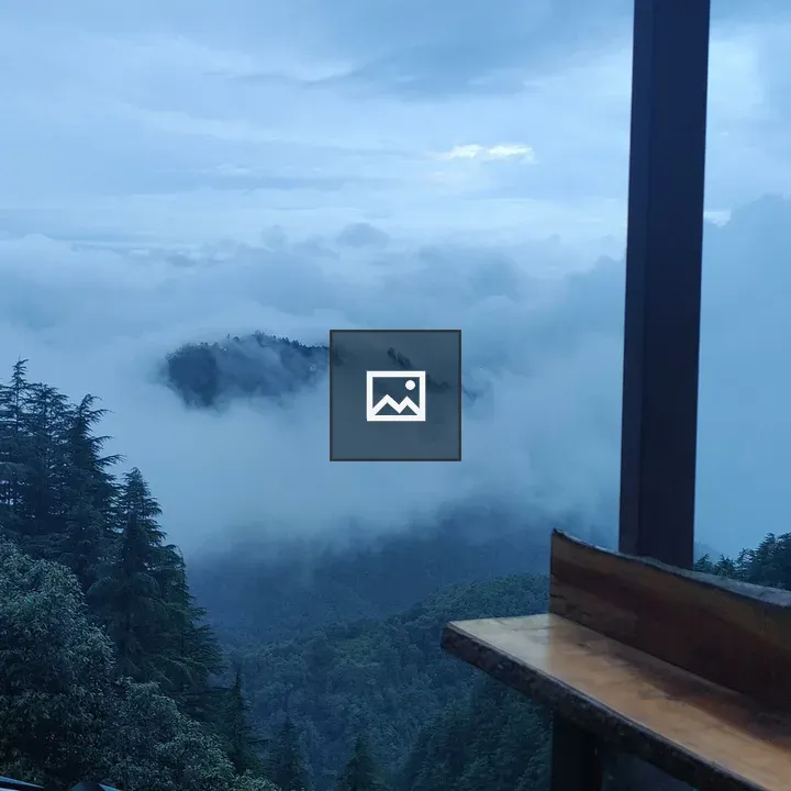 Clouds over mountain landscape