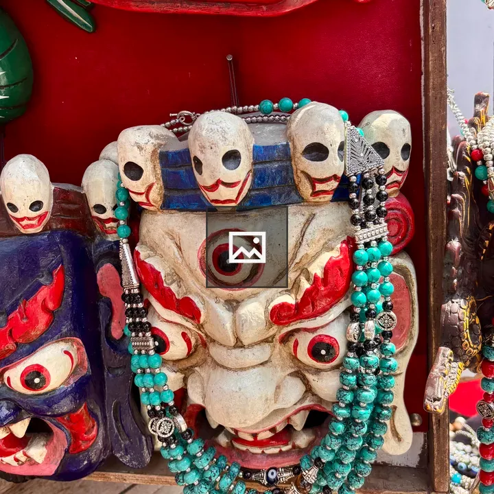 Colorful masks on red backdrop