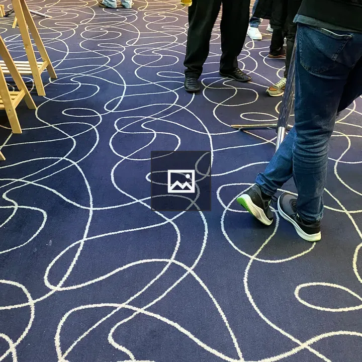 Blue swirly carpet and shoes