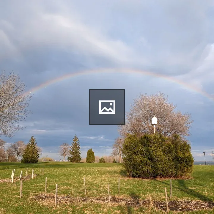 Rainbow over park by St. Lawrence River
