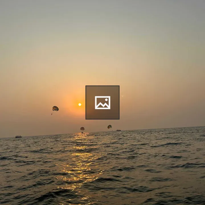 Sunset Ocean with Parasailors