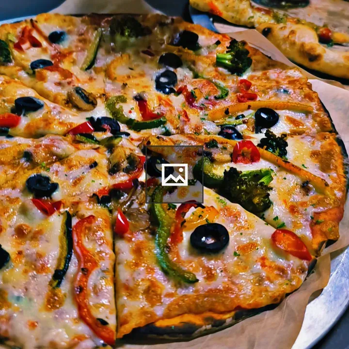 Pizza with colorful toppings