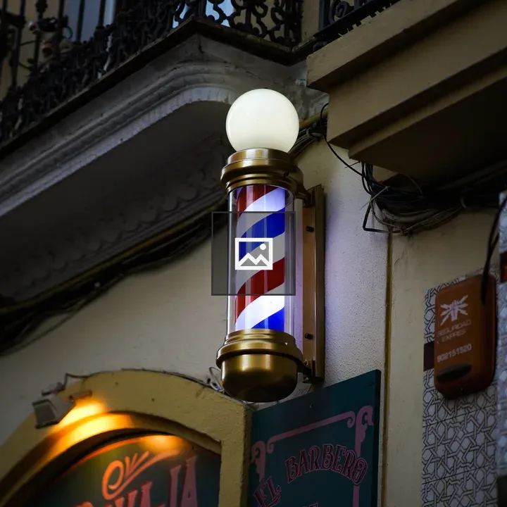 Red, Blue and White Barber Shop Sign