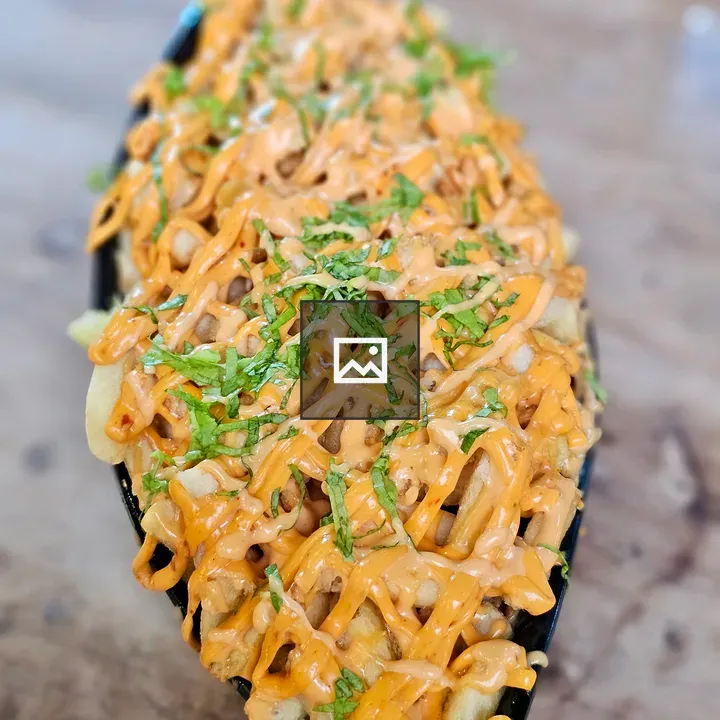Fries with Creamy Herb Topping