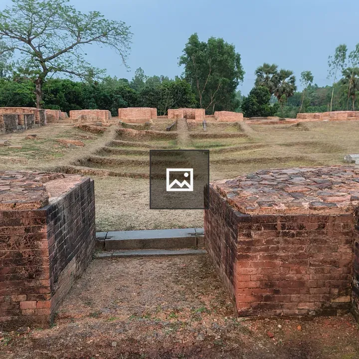 Ancient brick ruins in greenery