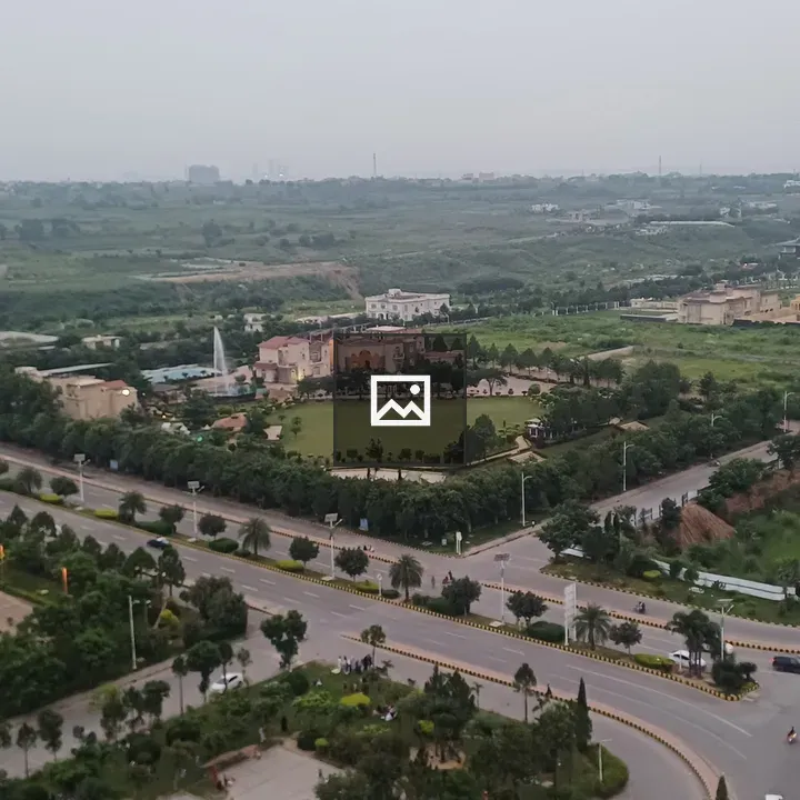 Road through Gulberg Greens landscape