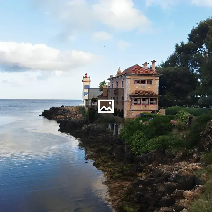 Coastline with House and Lighthouse