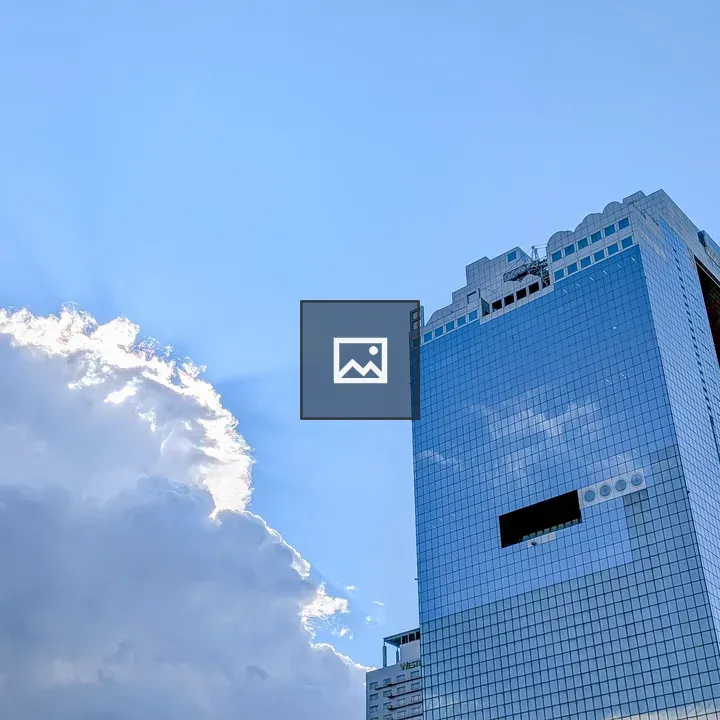 Glass Building Reflecting Sky