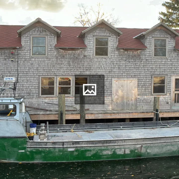 Fishing boat on riverbank