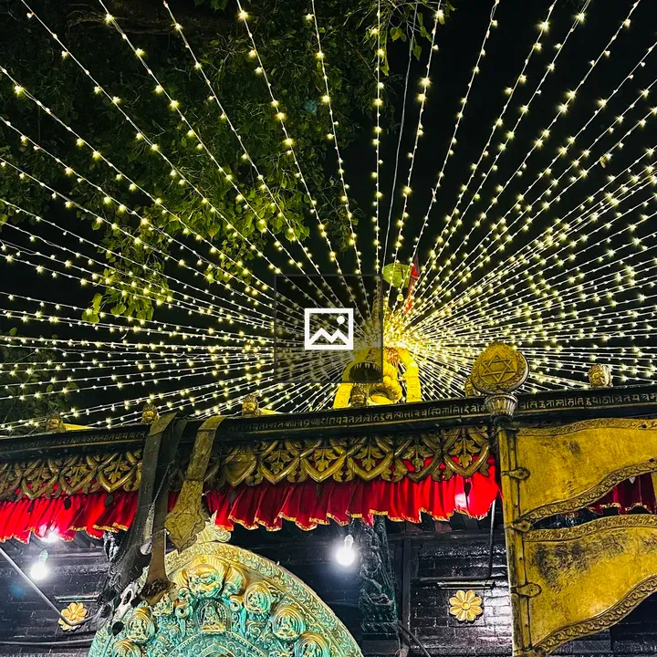 Temple facade lit with starburst lights