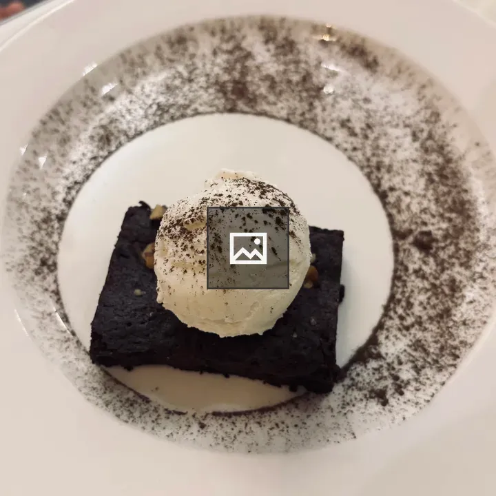Chocolate cake with vanilla ice cream