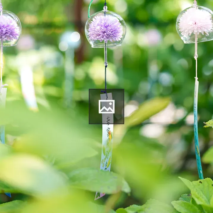 Glass wind chimes in garden