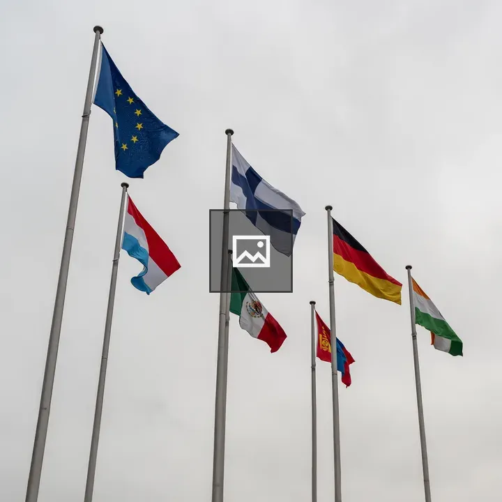 Flags against cloudy sky