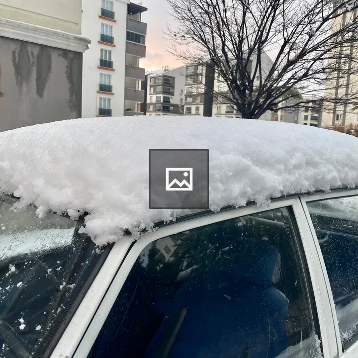 Snow on car hood