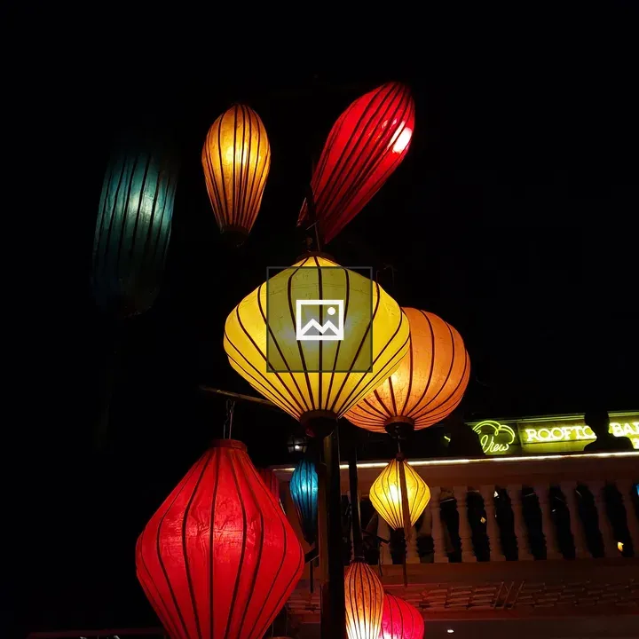 Nighttime lanterns on a pole
