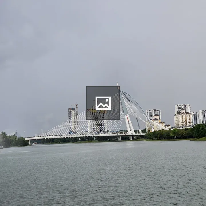 Artistic bride over river in Putrajaya