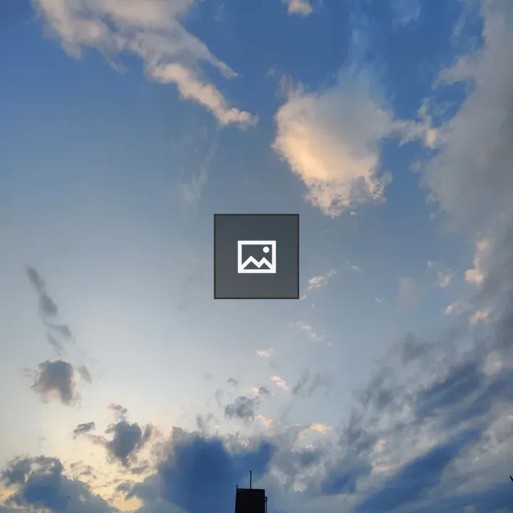 Sunset sky with silhouetted structure