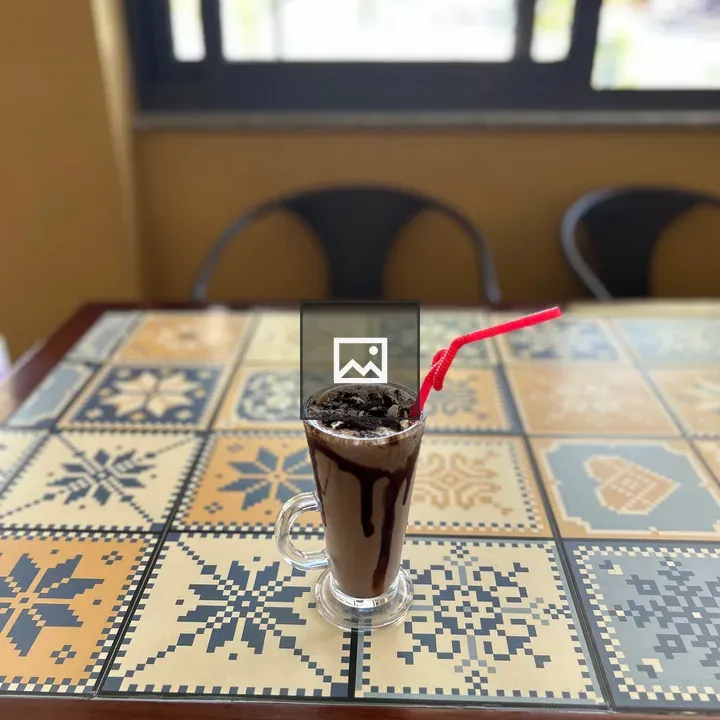 Tall Glass of Chocolate Milkshake