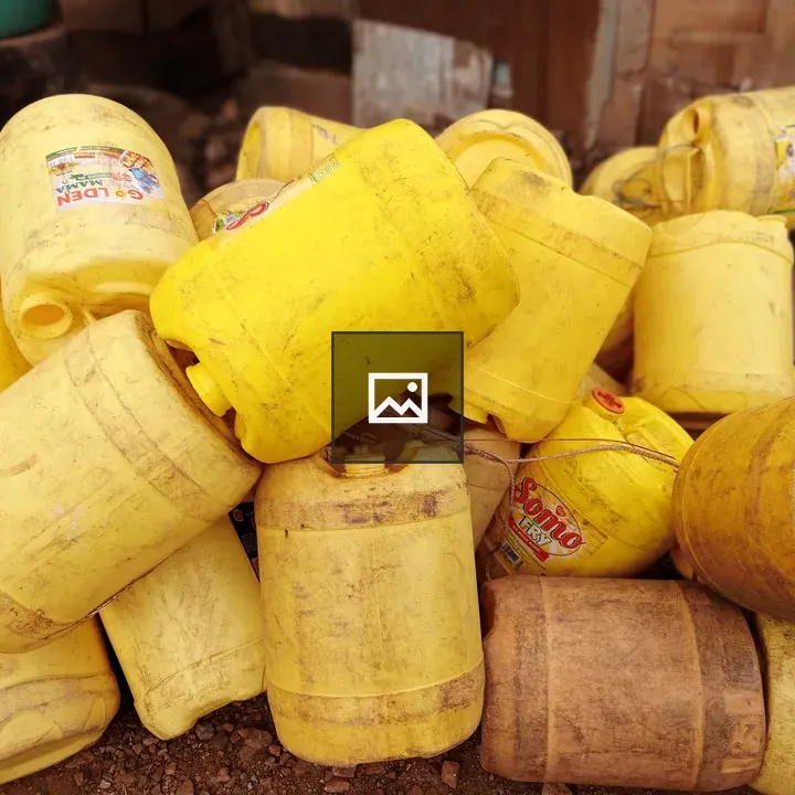Pile of yellow plastic jerrycans