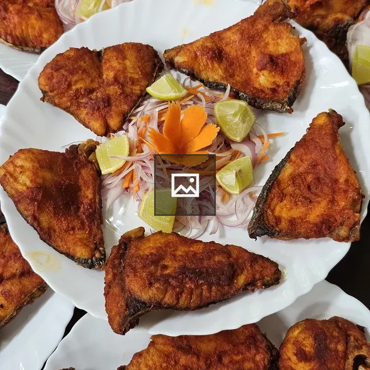 Fried fish plates with garnishes