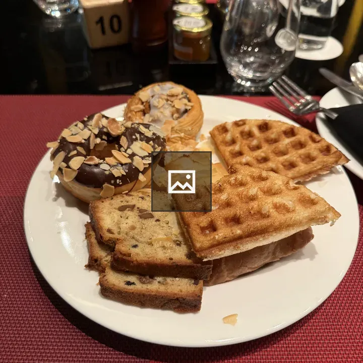 Breakfast pastries on a white plate