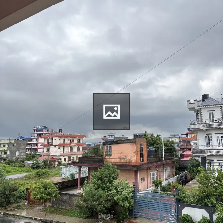 Balcony view of a cloudy neighborhood