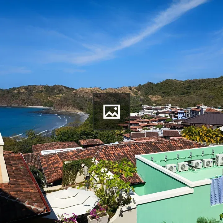 Coastal village with red-tiled roofs