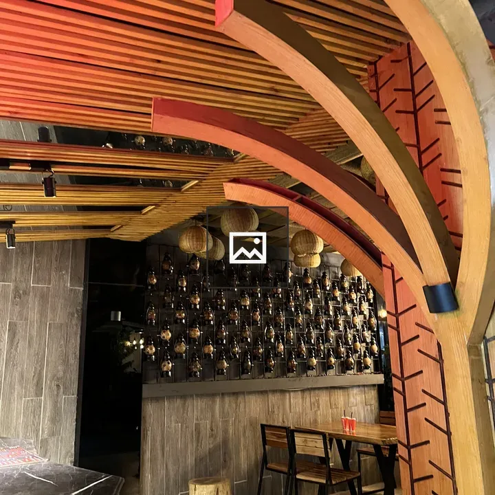 Restaurant staircase with warm lighting