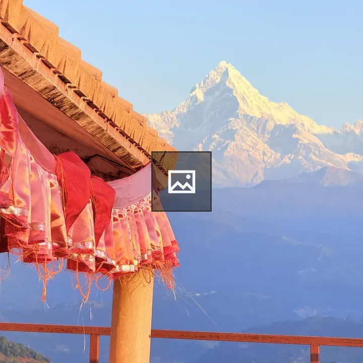 Snow-capped Mountains Rooftop Scene