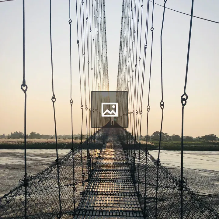 Narrow suspension bridge in Nepal