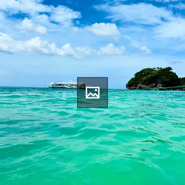 Boat on Turquoise Water