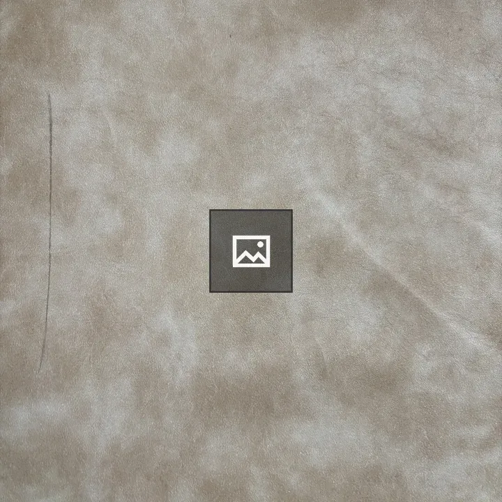 Beige textured surface with sofa