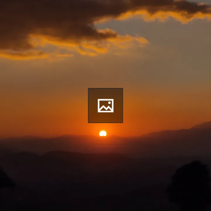 Sunset over dark clouds