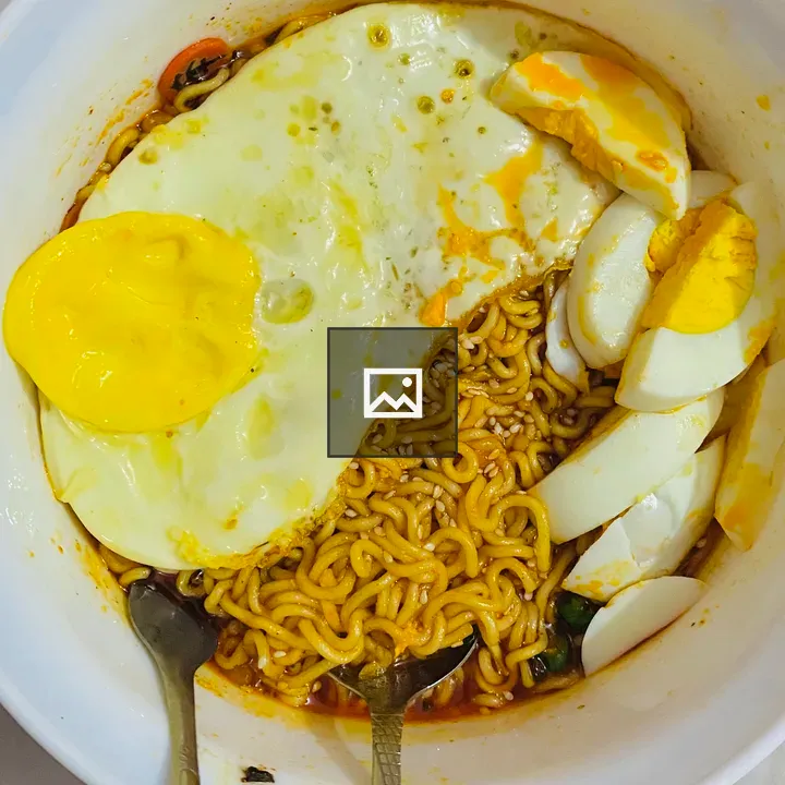 Noodles with Egg in White Bowl