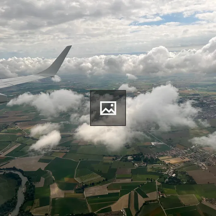 Patchwork of farms from plane window