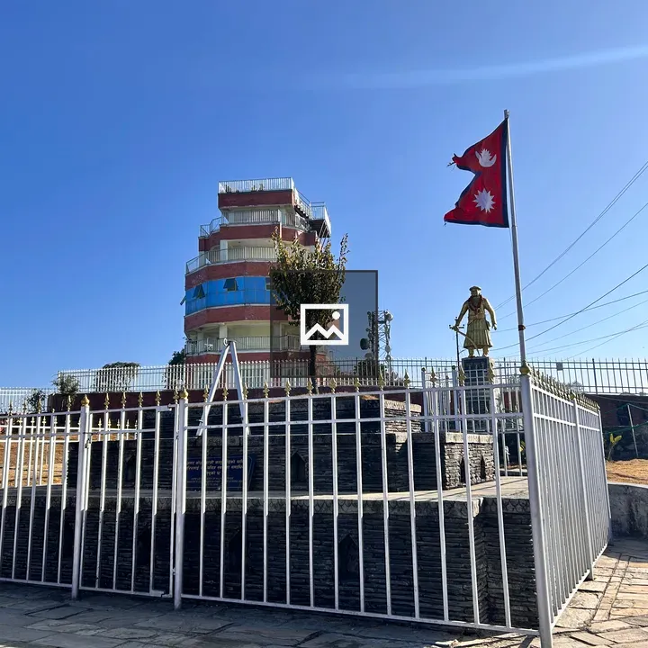 Tower, Statue, and Nepal Flag
