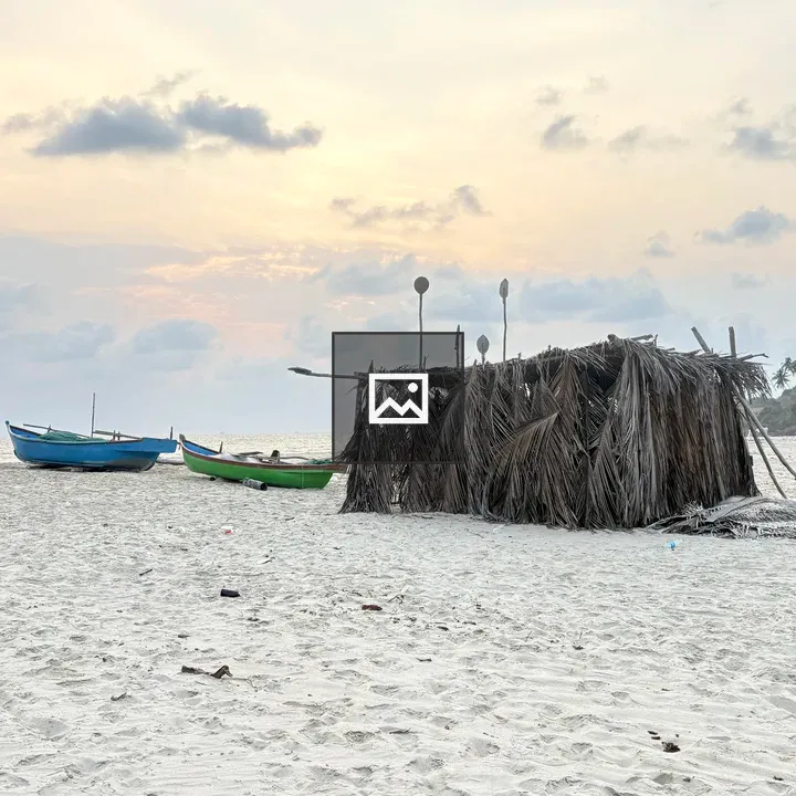 Thatched Palm Leaf Structure on Beach